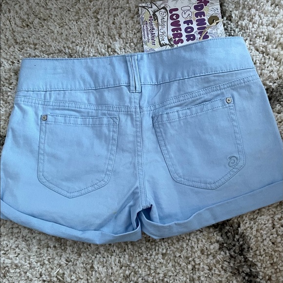 Light blue shorts . - Picture 4 of 5
